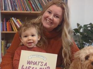Allison Antonio with her son Wesley and dog Arthur, the inspiration behind her book.