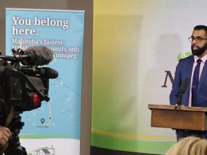 Obby Khan, Minister of Sport, Culture and Heritage, speaks at Niverville press conference.