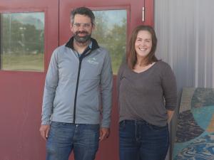Warren Britton and Meghan Beasant at the Niverville Centennial Arena, where a new lending library will soon open.