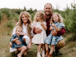 Laura and Julien Grenier with their three children.