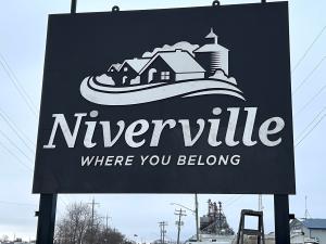 The new welcome sign on the east end of Niverville.