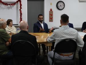 Obby Khan meets with supporters in Niverville.