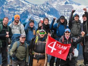 Doug Dyck celebrates with the rest of his 4M hiking group.