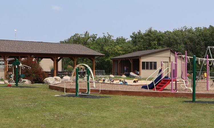 The park in Grande Pointe will be the site of a summer concert in August.