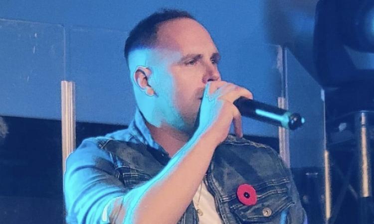 Local country music artist JR Charron in concert.
