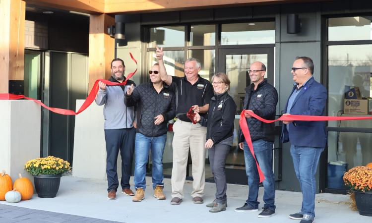 Jason Bodnarchuk, Chris Ewen, Mitch Duval, Janine Boulanger, Joel Lemoine, and Shane Pelletier at the ribbon-cutting ceremony.