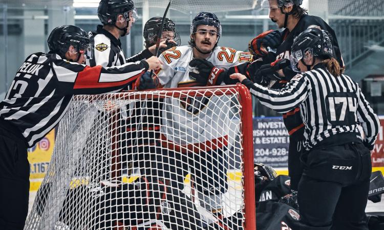 The Nighthawks scramble around the net.