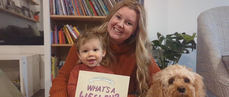 Allison Antonio with her son Wesley and dog Arthur, the inspiration behind her book.