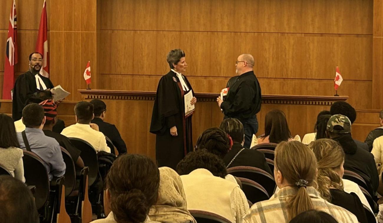 Paul Lavin becoming a citizen of Canada.