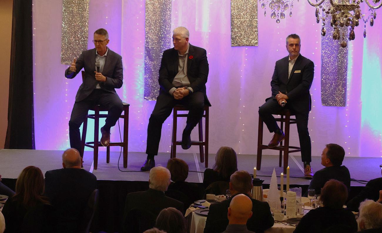 Mark Chipman, John Olfert, and Ron Parent speak at this year's Heritage Centre fundraising gala.