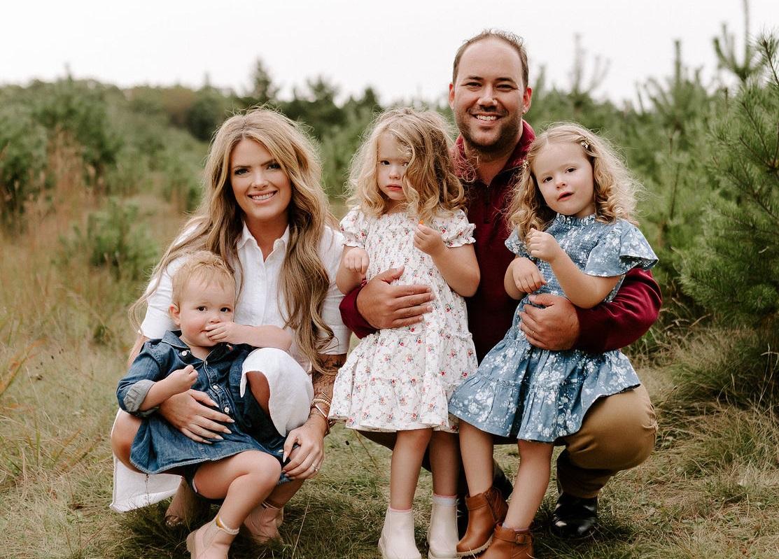 Laura and Julien Grenier with their three children.