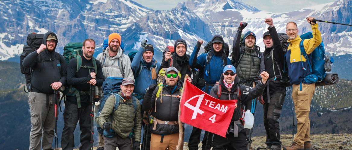 Doug Dyck celebrates with the rest of his 4M hiking group.