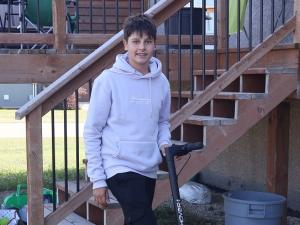 Chris Shvets, a 13-year-old e-scooter user from Niverville.