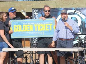 Stephen McCabe and Kurt Carter of Lorette accept the grand prize at the first annual Niverville Smokemaster BBQ Competition.