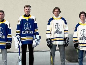 Junior C Clippers players Elijah Durksen, Nathan Rempel, Jaxsen Friesen, and Ethan Fehr show off this season's new jerseys.