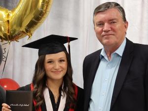 Mayor Myron Dyck with Town of Niverville Award recipient Taylor Sakwi.