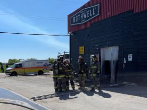Firefighters attend a fire at the Bothwell Cheese factory on June 1.