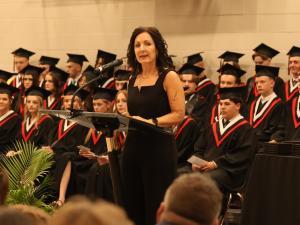 NHS Principal Kimberley Funk addresses this year's graduates.