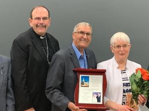 Father Gerald Michaud, Archbishop Albert LeGatt, Reginald and Ghislaine, Father Gregory Kossi Djiba.