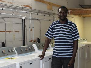 Napoleon Lasu of the new Cush Laundry Mart in Niverville.