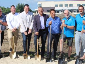 Councillor John Funk, Clare Braun, MLA Shannon Martin, Mayor Myron Dyck, MP Ted Falk, Minister of Infrastructure Ron Schuler, Councillor Chris Wiebe, Councillor Nathan Dueck, and Libby Hanna.
