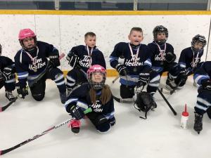 Landon Friesen, Mia Maloney, Brody Burke, Jacey Rae Dorcht, Zachary Boone, Sawyer Kroeker, Braylin Gray, and Asher Funk of the Clippers Initiation White team.