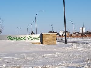 The entrance to the Tourond Creek development in St. Adolphe.