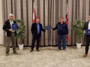 Marianne Porter, Yvette Bernat, Roger Perron, MLA Ron Schuler, Claude Lemoine, Ritchot Mayor Chris Ewen, and Councillor Shane Pelletier at the TC Energy Centre.