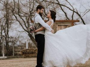 Darryl Wolfe and Becky Mentuck at their smaller-than-intended wedding in April.