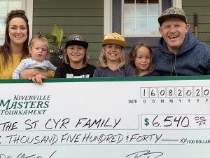 Jordan and Heather St. Cyr, with their four children.