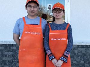 Zhe Gao and Huiyang Ren, the husband and wife team behing Aline’s Thai & Pizza.