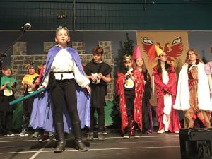 Class 4P at NES performing on the evening of May 1.