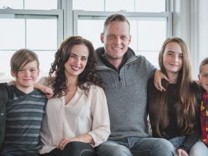 Colleen and Grant Dyck alongside their four children, Moses, Leo, Oskar, and Georgia.