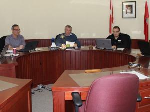 Councillors Shane Pelletier and Curtis Claydon, CAO Mitch Duval, Mayor Chris Ewen, and Councillor Ron Mamchuk. Councillor Janine Boulanger was absent.