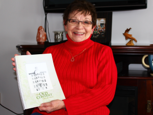 Rhea Trudeau with her book, The Old Convent Tells Its Story.