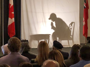 Silhouette vignettes being performed at this year's Remembrance Day ceremony in Niverville.