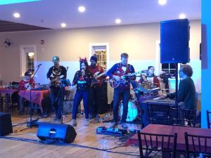 Last Call puts on a show at their holiday dance party.