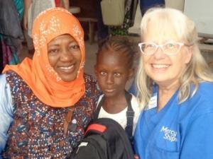Laura Klassen with a patient and her mother while on a medical mission in Africa.