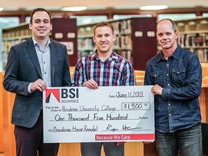 Cody Quiring of Providence, Ryan Hamm of BSI Niverville, and Dan McLeod, Providence's Director of Facilities Management