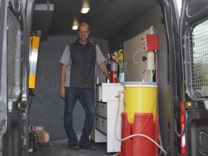 Emile Jolicoeur stands ready in the Freedom Fire mobile unit.
