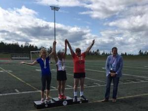 Sandra Klassen, on the far left, receiving a silver medal in track.
