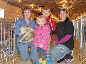 Lorna Warkentin with her grandchildren Page and Nate, and Charity Dueck