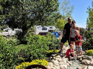 Lise and Bruce Bale with two of their three children after another busy day managing the Arrowhead RV Park