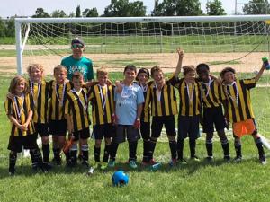 Coach Todd Neil, (l-r) Kerrick Neil, Max Dowse, Tom Bray, Raine Doiron, Dallin Hornung, Zachary Normand, Kaleb Collette, Micah Penner, Levi Brandt, Michael Olatundun, Ethan Bowyer
