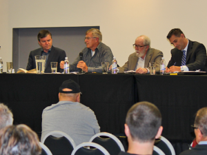 Dawn Harris presides over a town hall discussion with Mayor Myron Dyck and councillors John Funk, Chris Wiebe, Nathan Dueck, and Kevin Stott