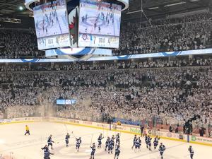 The hometown crowd, in full whiteout mode, celebrates a playoff victory over the Minnesota Wild