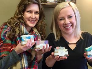 Ricki ten Hove and Amy Buhler show off their wares