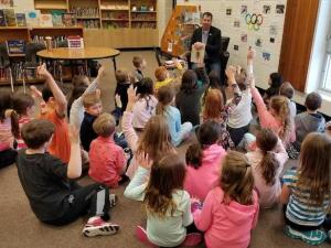 MLA Shannon Martin reads to Niverville students.