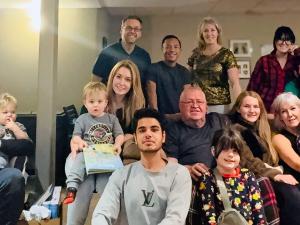 Anmol celebrates his first Christmas ever with the Braun family in Niverville.