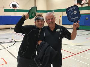 Ritchot Mayor Chris Ewen and Councillor Jeannot Robert show off their pickling skills